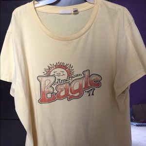 Light yellow American Eagle ‘77 tee.